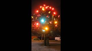 Traffic light tree at night in London Profile