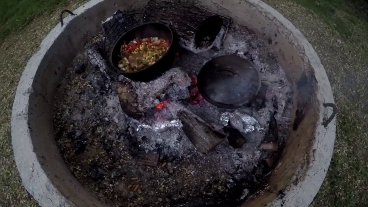 Cooking on the open fire with Cast Iron Chicken YouTube