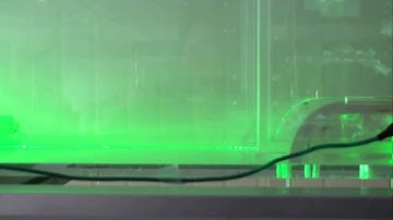 Flow separation suppression of bluff body using AC DBD plasma and flow visualization