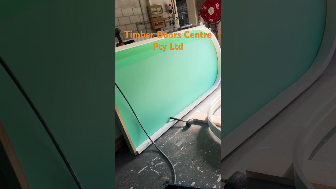 Arch solid timber door . Custom made from Timber Doors Centre Pty Ltd