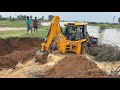 Jcb 3dx plus going to plug broken village pond  jcb