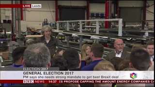 Theresa May avoids questions from journalist on live TV