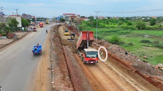 DumpTruck HYUNDAI Unloading Stone Filling To Contruction New Road With Bulldozer CAT Push