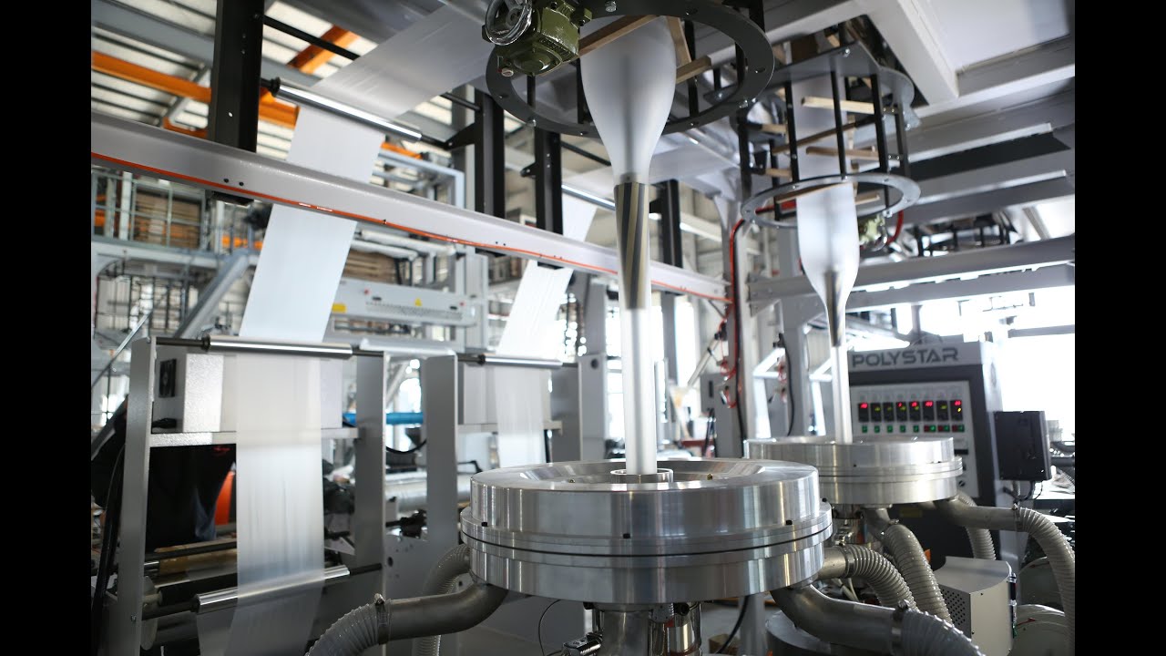 Different material twin head blowing film machine