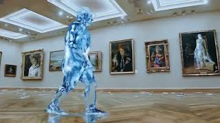 A Walking Figure Made Out Of Water Tours An Art Gallery