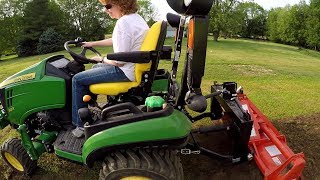 subcompact tractor (deere 1025r / kubota bx, etc) is perfect for garden tilling