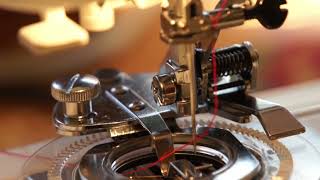 Janome 8077 sewing machine with Daisy Foot attachment.