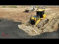 The Power Machine Dozer Equipment Pushing In Mud Hard Removing Shantui Worker Dump Truck Spreading