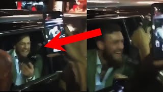 Conor McGregor hands out Proper Twelve whiskey bottles to fans