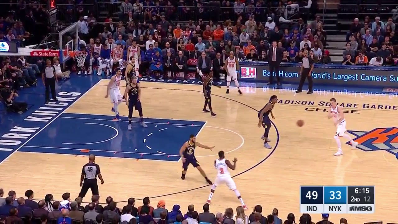 Porzingis slipping ball-screen, then hits mid-range