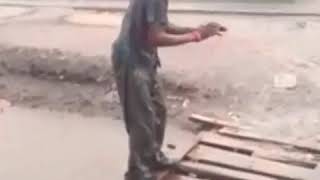 A Man Swim Inside Flood After Smoking Indian Herb