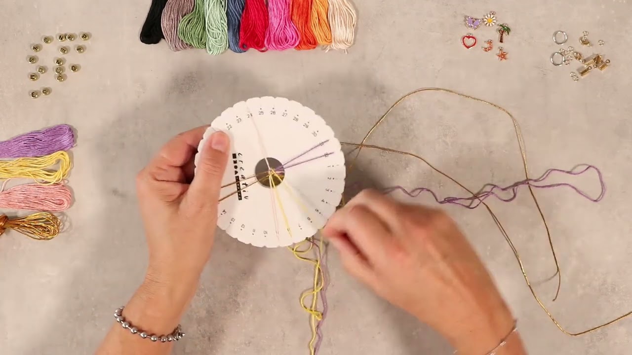 Learn to braid a striped pattern a the Kumihimo knotting disc