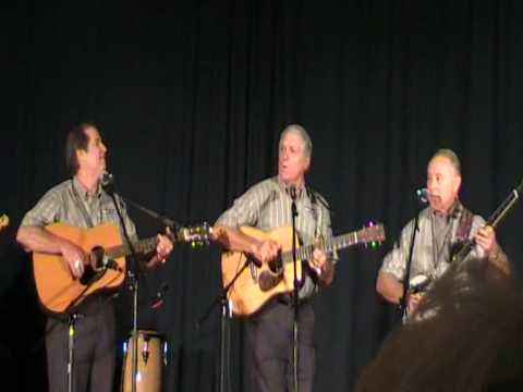 Bert Williams, Tony Lay and Tom Sanders singning "...