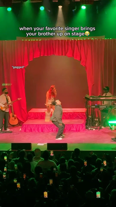 When your favorite singer brings your brother up on stage 😭