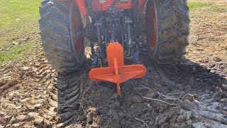Ripping and tearing! Busting out roots with Kubota M6060 and single shank ripper.