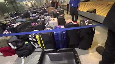 Countless bags at the airport. Dozens of flights a...