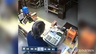 Robber pulls gun, liquor store clerk is faster