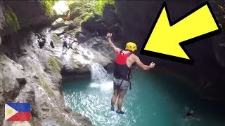 JUMPING OFF WATERFALLS (w/ footage!) | Philippines Vlog 14
