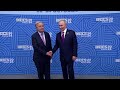 Putin and UN chief Guterres shake hands on final day of BRICS summit
