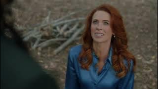 Bridget Regan in blue satin blouse and black leather skirt - The rookie - S05E17