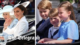 video: Not too much waving, Louis! Princess Charlotte lays a restraining hand on her little brother at Trooping the Colour