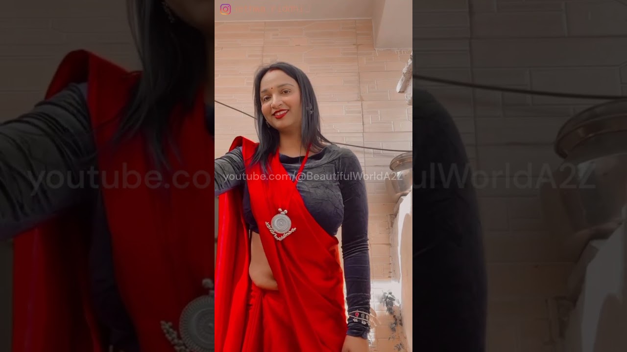 236: Beautiful bhabhi in a satin silk saree