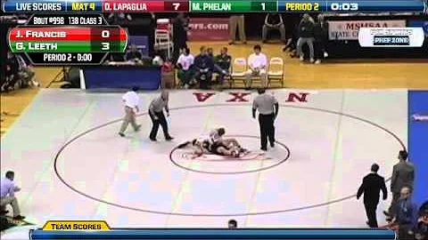 Farmington's Jesse Francis wrestles against Kearne...