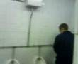Inflatable Bat Whacking Guy In Toilet