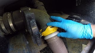 How to Dump Black and Gray Water Tanks from an RV