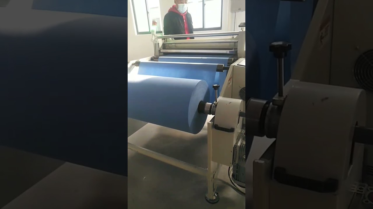 nonwoven roll to sheet cutting