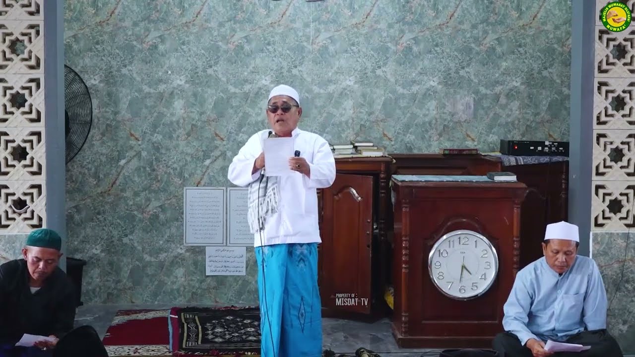 TAUSHIYAH KH HASAN MUAYYAD DJAUHARI DALAM RANGKA MAJLIS (MUWAFA') MUWASAT DLU'FA'