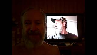 Butt Naked Man watches himself on YouTube