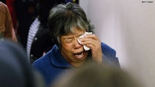 'All lives are lost': Families react to Flight 370 tragedy
