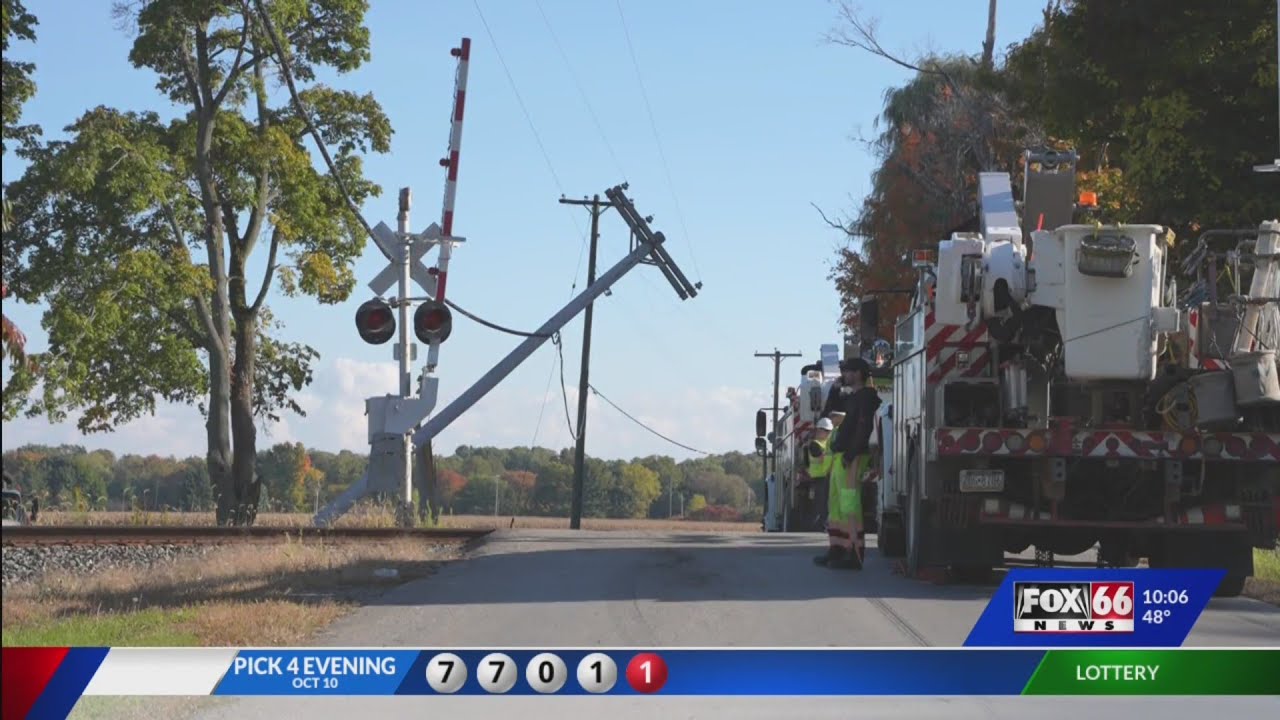 Truck hits utility pole in Lake City, suspends traffic - YouTube