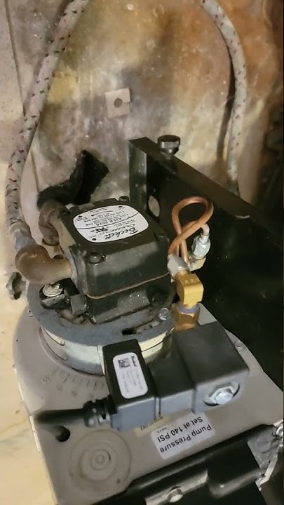 installing a new oil pump to beckett burner - YouTube
