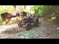 70 year old David Brown Tractor fixing road after 50 year flood..