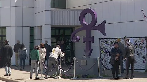 Fans gather at Paisley Park to pay tribute to Prince on anniversary of death