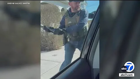 ICE agents smash car window to detain man sitting inside