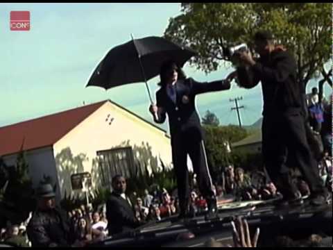 Michael Jackson dancing on a car at his court appearance