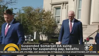Suspended Somerset DA suing county