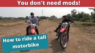 How to ride a tall motorbike when you are short