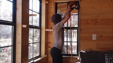 DIY Cabin Build | Finishing up Window Trim In The Living Room