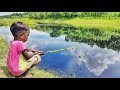 Beautiful fishing2023  smart little boy catching fish by fish hook in village river side