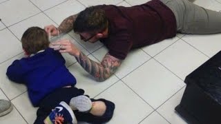 Barber Lays On Ground To Give Boy With Autism Haircut