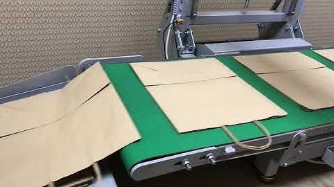 Feeder for Bags with Handles | TICAB Printing System TPS