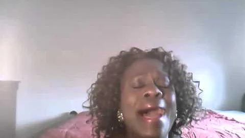 Deloris Scott singing (I KNOW WHO HOLDS MY HAND)