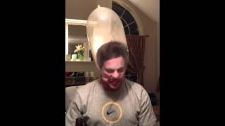 Justin puts Condom on his head