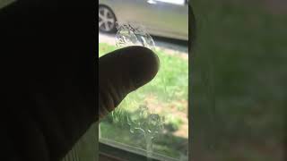 “removing” TAPE RESIDUE the easy way (from glass window)