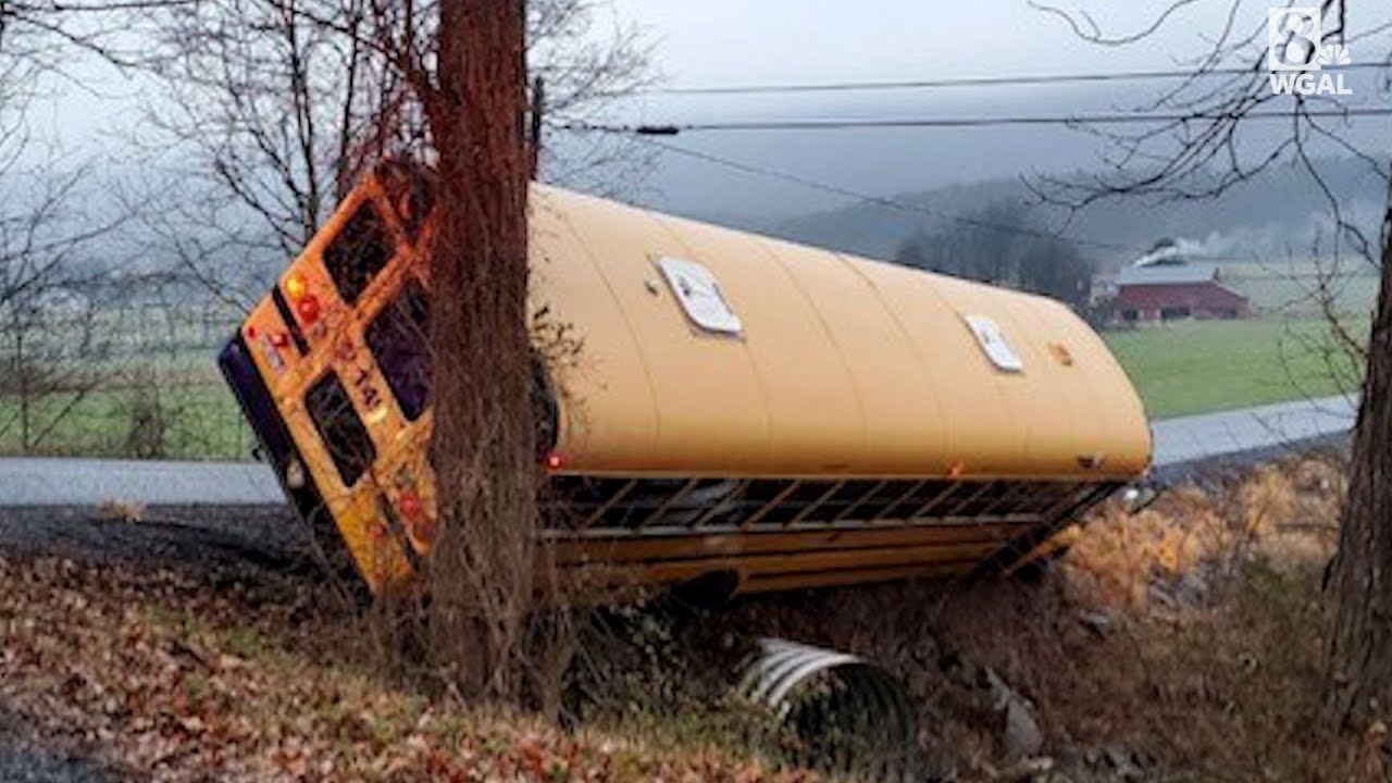School bus slides of icy road in Mifflin County, Pa. - YouTube
