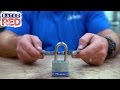 Breaking a padlock with wrenches man hacks